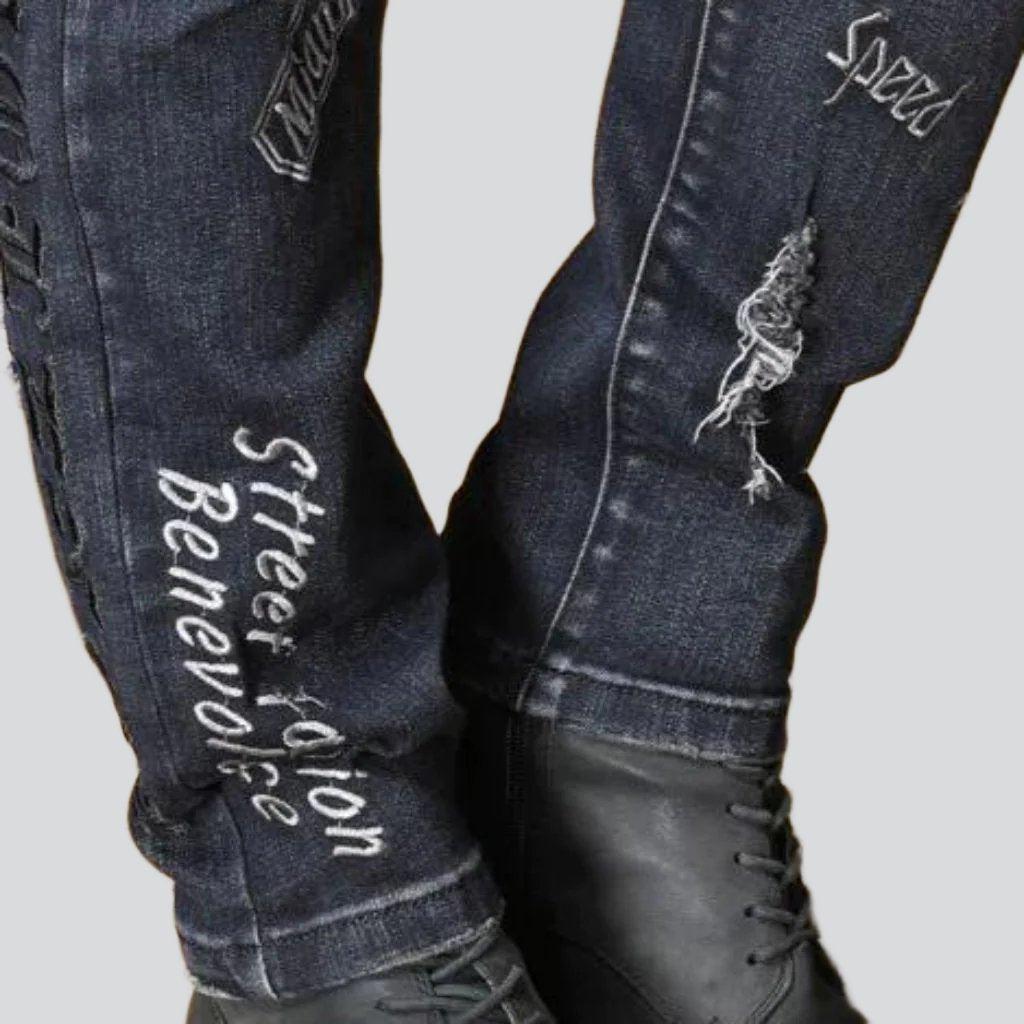 Sanded embroidered jeans for men