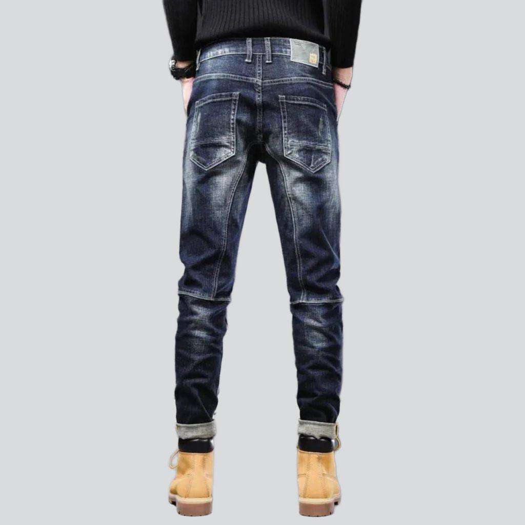 Dark wash sanded biker jeans