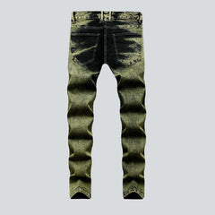 Green over-dyed distressed jeans