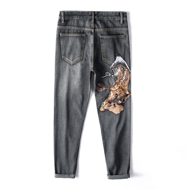 Graue Herrenjeans mit Tigerstickerei