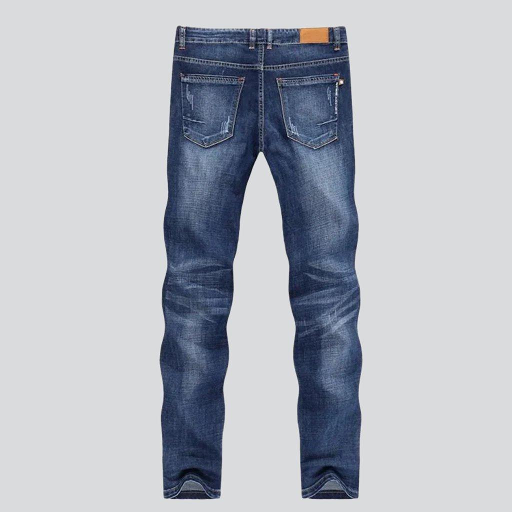 Whiskered medium wash men jeans