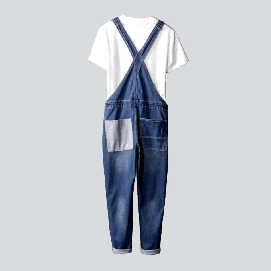 Grauer Denim-Jumpsuit mit Rechteck-Print