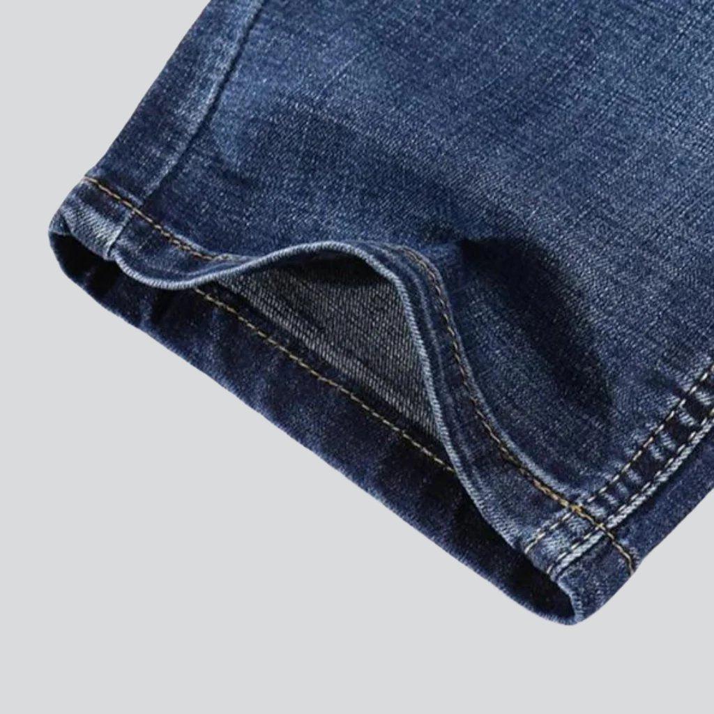 Whiskered medium wash men jeans