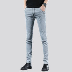 Mid-waist light men wash jeans