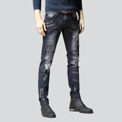 Sanded embroidered jeans for men