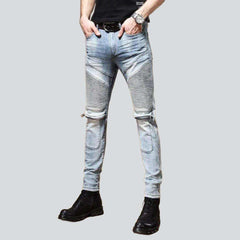 Light blue stylish biker jeans