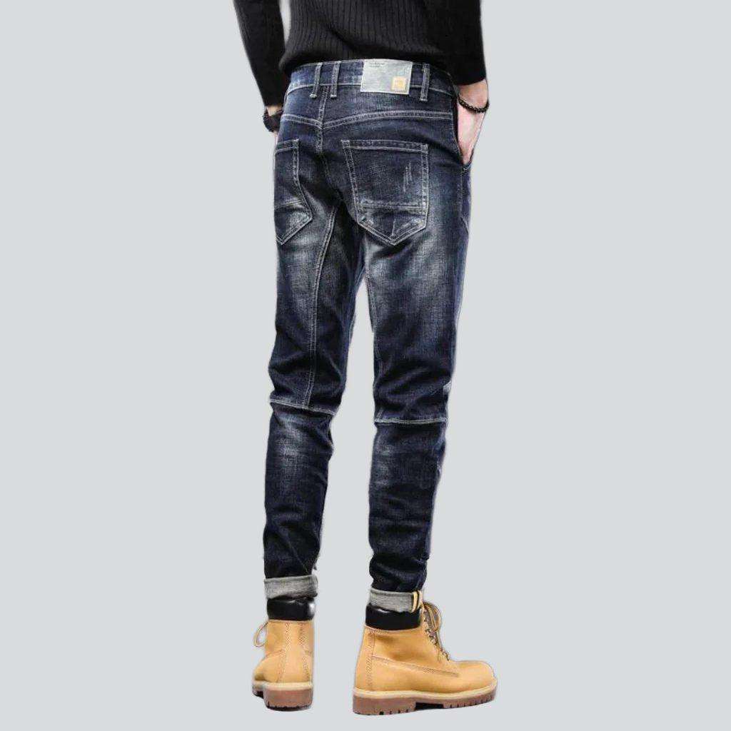 Dark wash sanded biker jeans