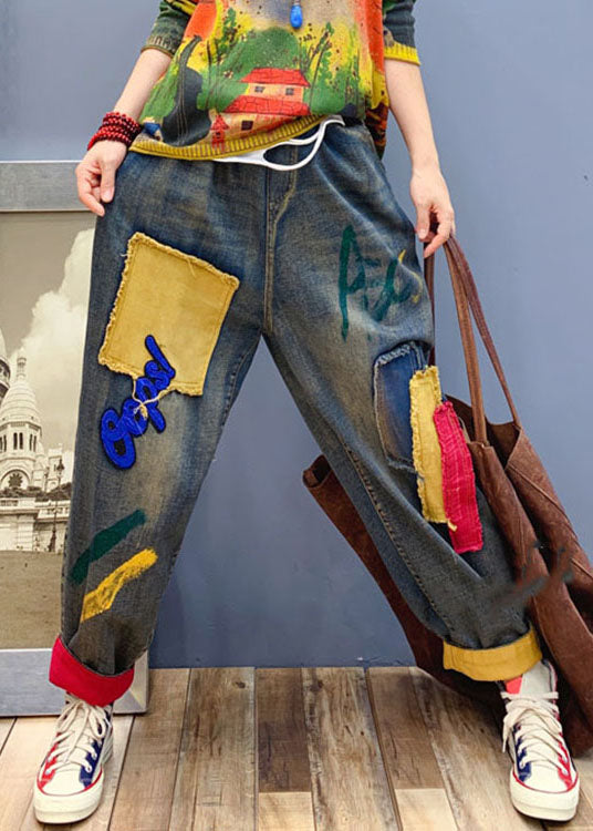 Pantalones vaqueros con apliques de parche azul hechos a mano