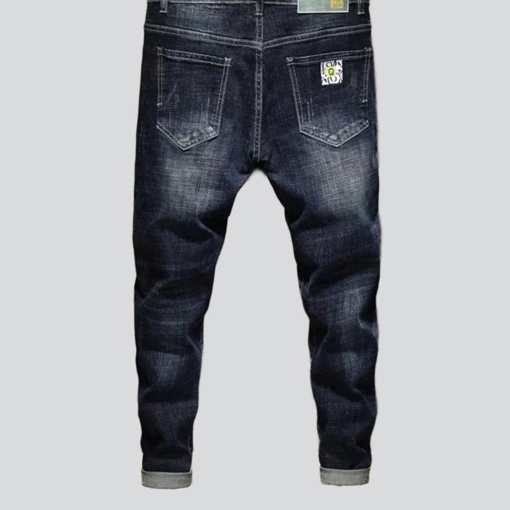 Bemalte Knieflicken-Jeans für Herren