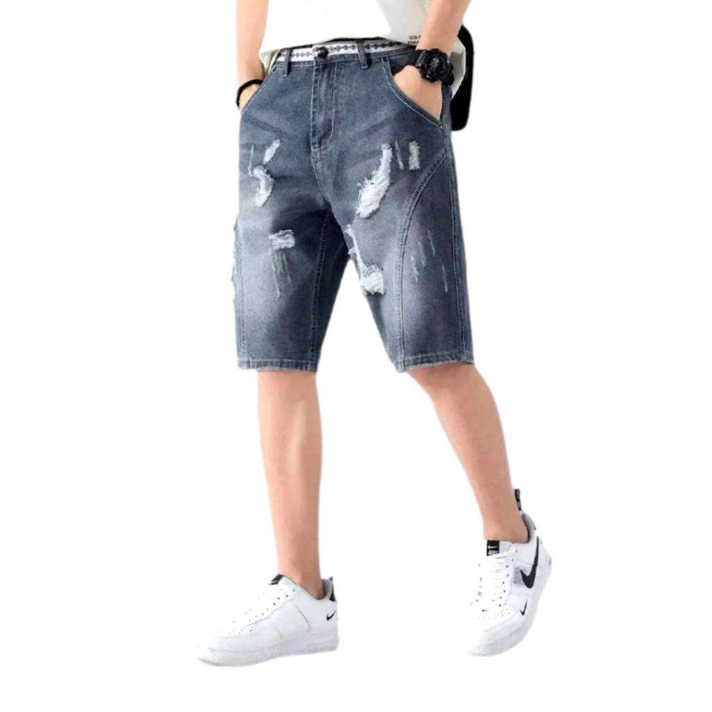 Loose men ripped denim shorts