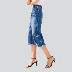 Distressed hem midi denim skirt