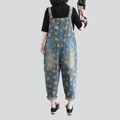 Jeans-Overall mit Flicken und Sonnenblumen-Print