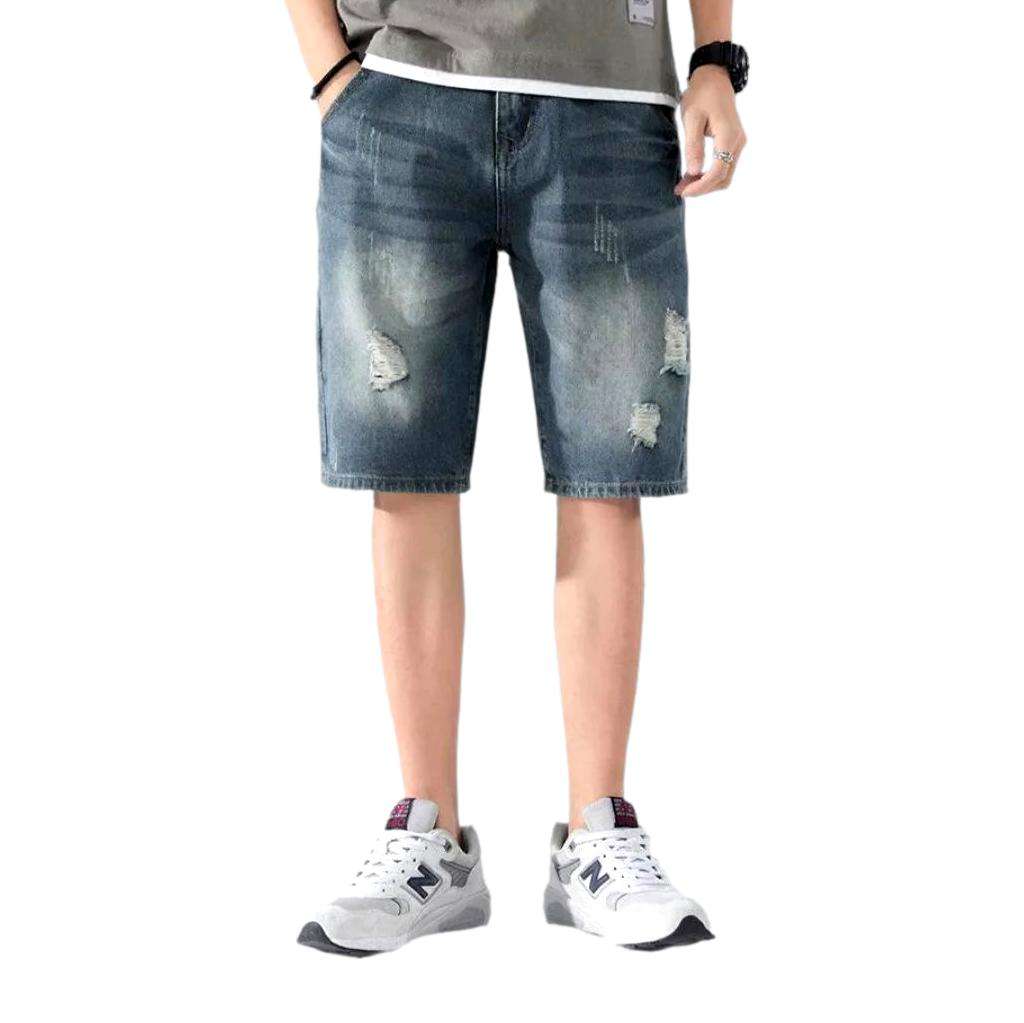 Lockere zerrissene Vintage-Jeansshorts