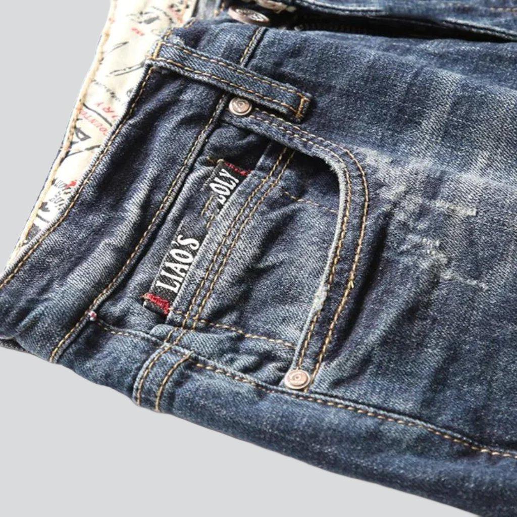 Vintage-Jeans für Herren mit bedruckten Taschen