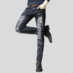 Sanded embroidered jeans for men