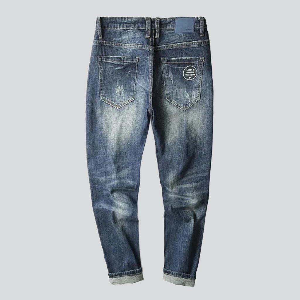 Vintage-Jeans für Herren mit bedruckten Taschen