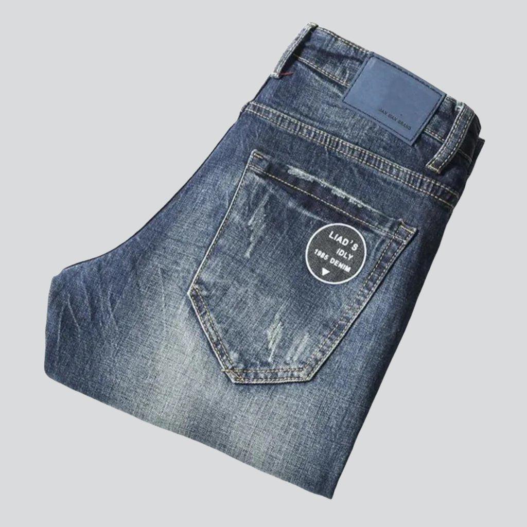 Vintage-Jeans für Herren mit bedruckten Taschen