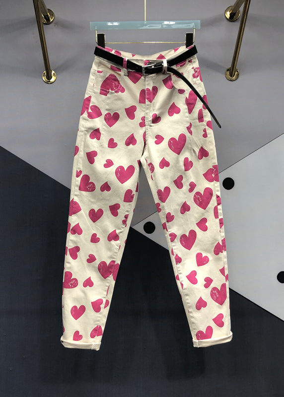 Pantalones vaqueros de patchwork con bolsillos y estampado de corazones y rosas italianas para otoño