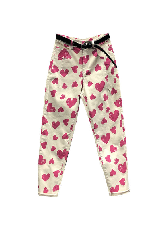 Pantalones vaqueros de patchwork con bolsillos y estampado de corazones y rosas italianas para otoño