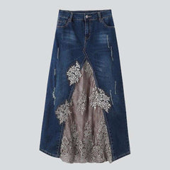 Jeans skirt decorated with lace