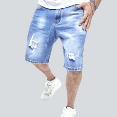 Light blue ripped denim shorts