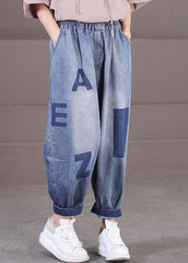 Lockere blaue Haremshose aus Baumwolldenim mit elastischen Taillentaschen und Buchstabendruck