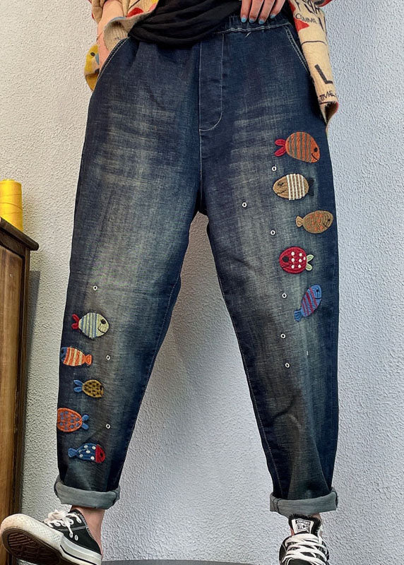 Pantalones harén de mezclilla holgados con bordado azul