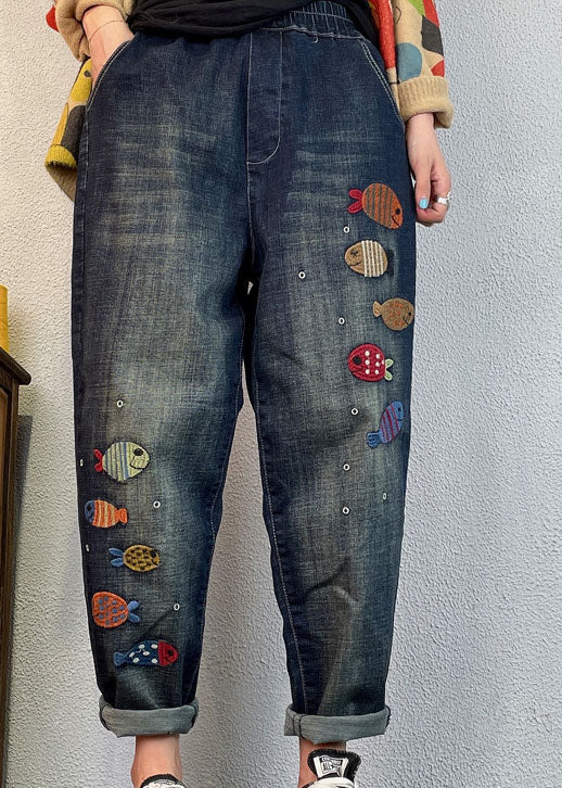 Pantalones harén de mezclilla holgados con bordado azul