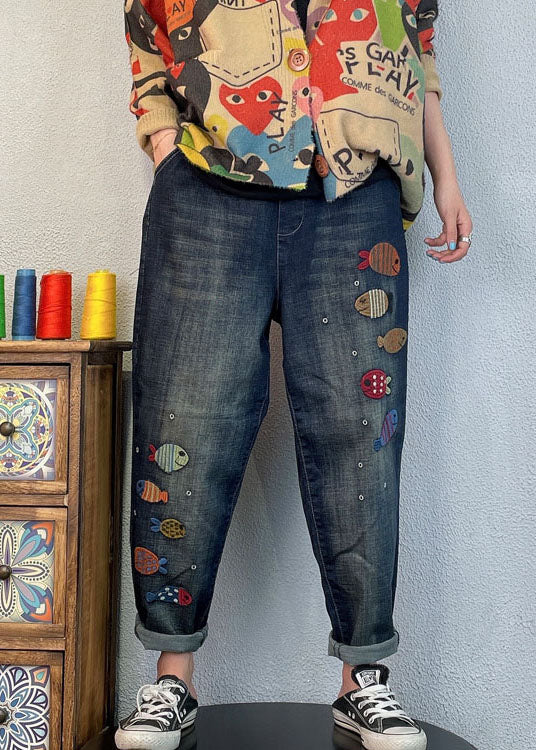 Pantalones harén de mezclilla holgados con bordado azul