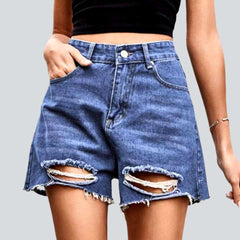 Medium wash distressed denim shorts