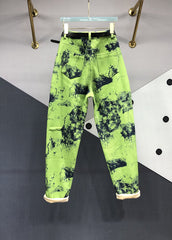 Pantalones vaqueros de patchwork con bolsillos y efecto tie-dye en verde moderno para otoño