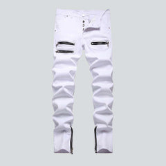 Monochrome white jeans with zippers