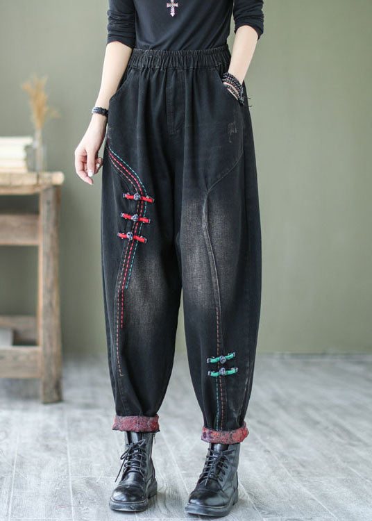 Pantalones harén de mezclilla con botones negros naturales