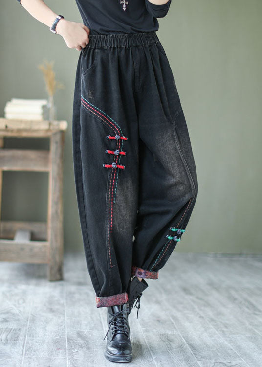 Pantalones harén de mezclilla con botones negros naturales