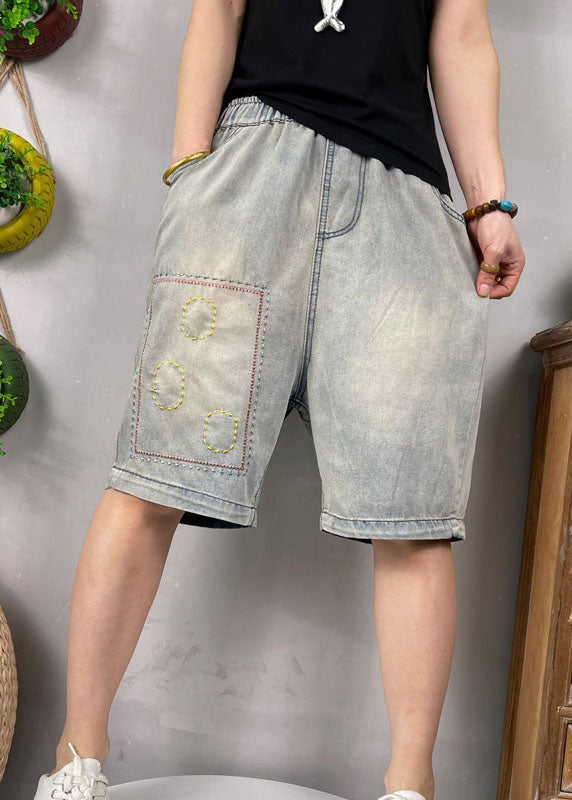 Naturblaue bestickte Jeansshorts