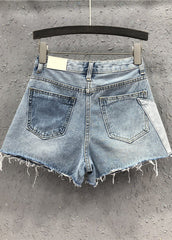 Neuartige blaue asymmetrische Patchwork-Jeansshorts mit hoher Taille