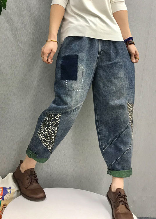 Pantalones de mezclilla con apliques de parche azul orgánico