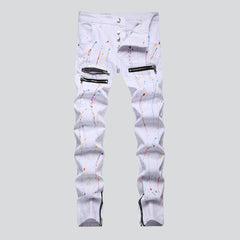 Painted white jeans with zippers