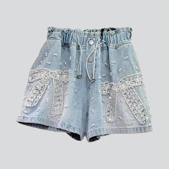 Pearl ornament embellished denim shorts