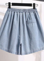 Hellblaue Patchwork-Jeansshorts mit Taschen in Übergröße