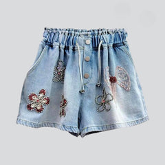 Rhinestone flower embellished denim shorts