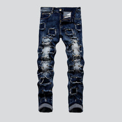 Rivet embellished patched men jeans