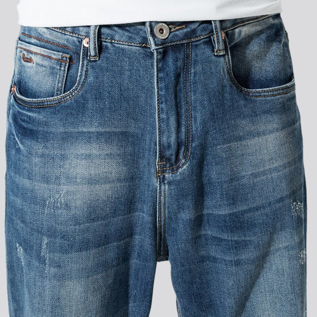 Men medium-wash jeans