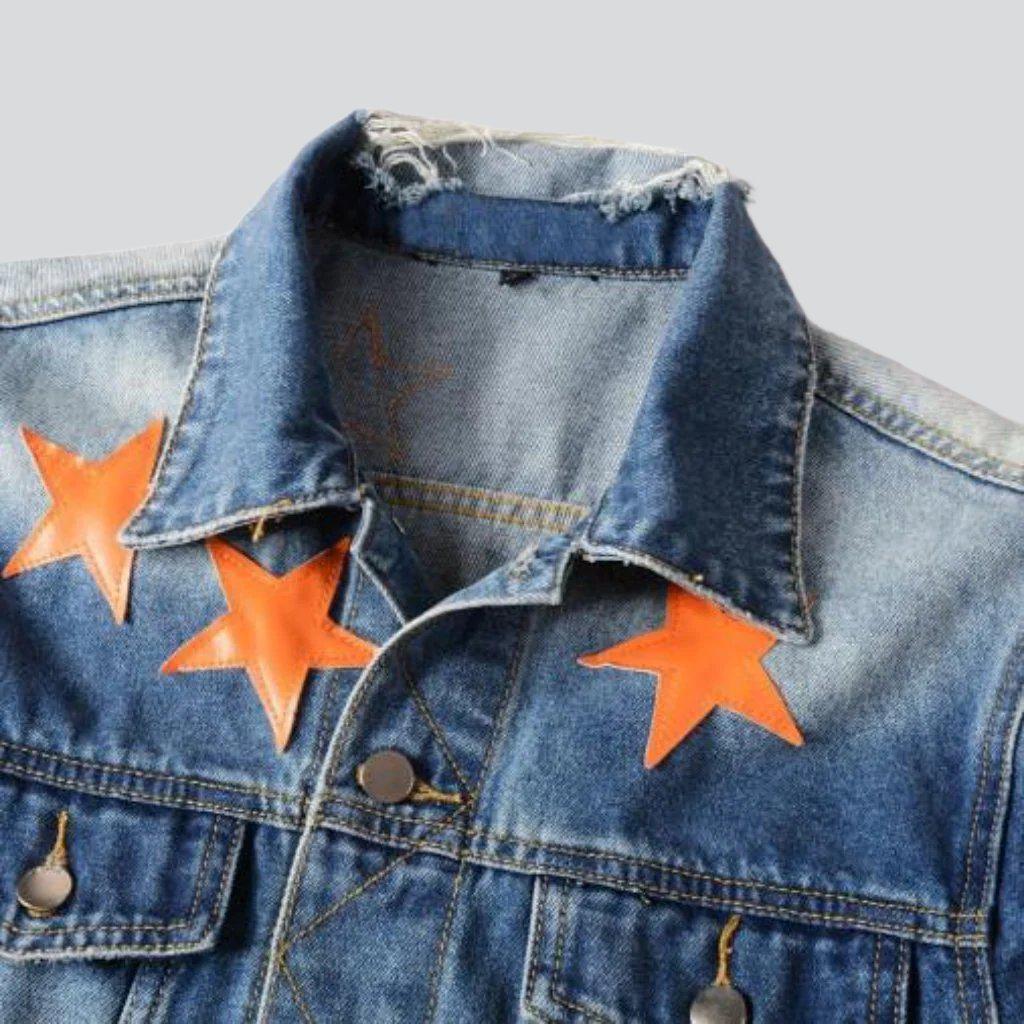 Chaqueta vaquera vintage con estrellas naranjas