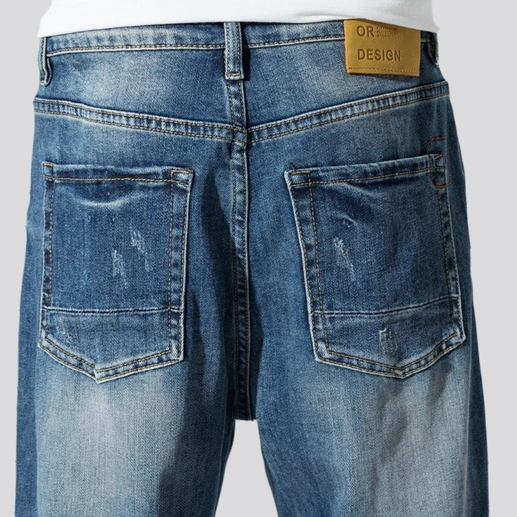 Men medium-wash jeans