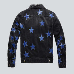 Chaqueta vaquera negra con estrellas azules