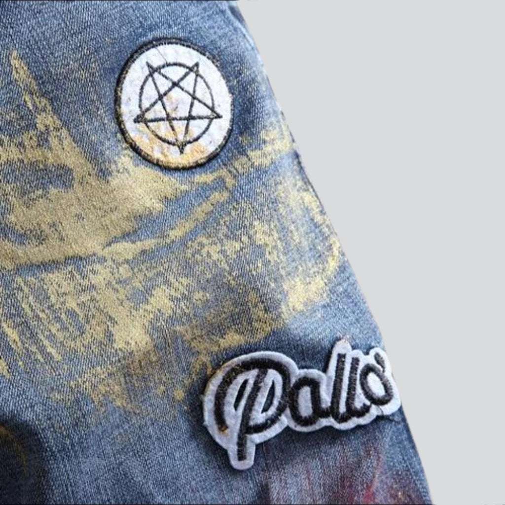 Pantalones cortos de mezclilla bordados con pintura de grafiti