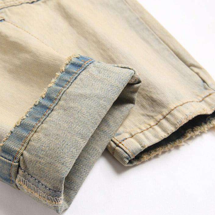 Distressed men jeans with zippers