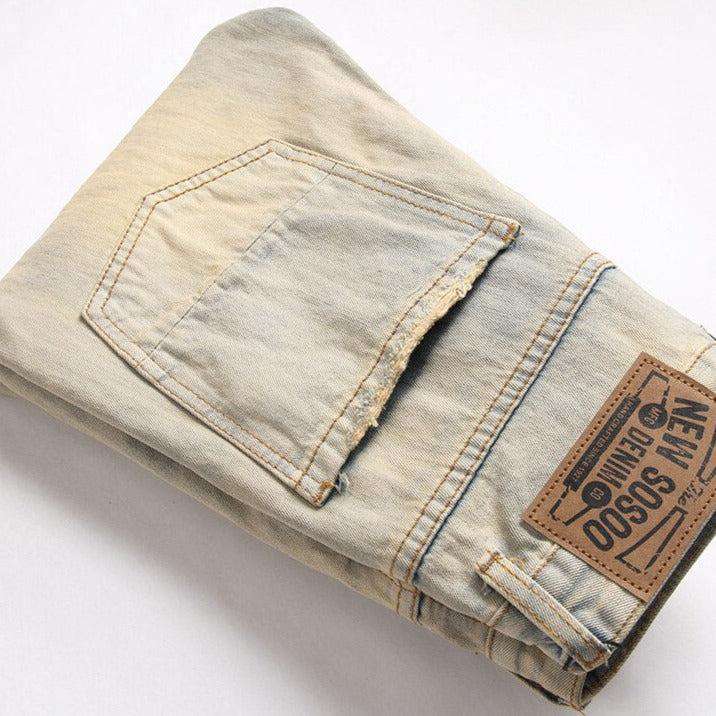 Distressed men jeans with zippers