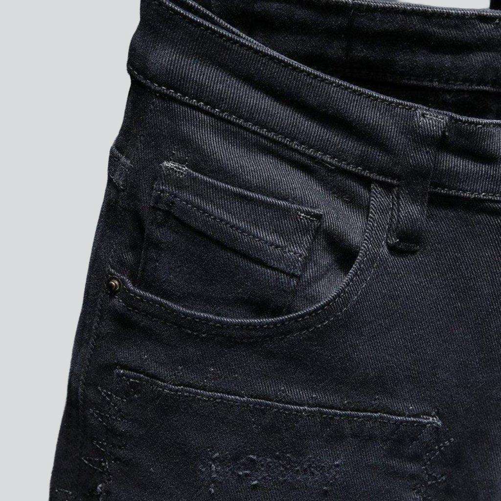 Black distressed jeans for men